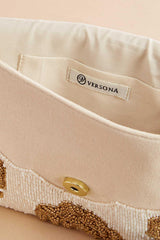 gold beaded rosette clutch Versona Accessories