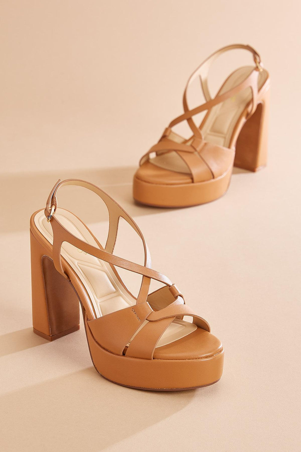 faux leather crisscross platform heels Versona Shoes