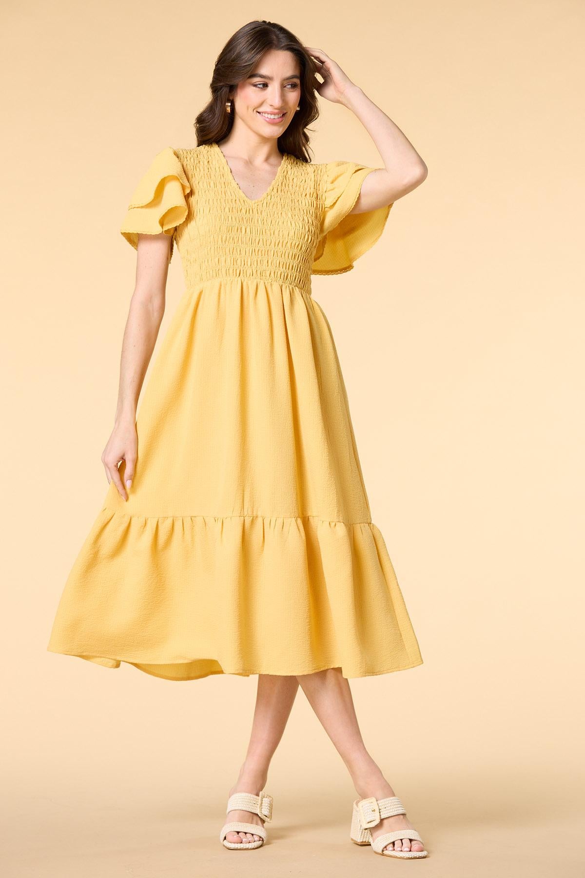 smocking the boat midi dress Versona Trends