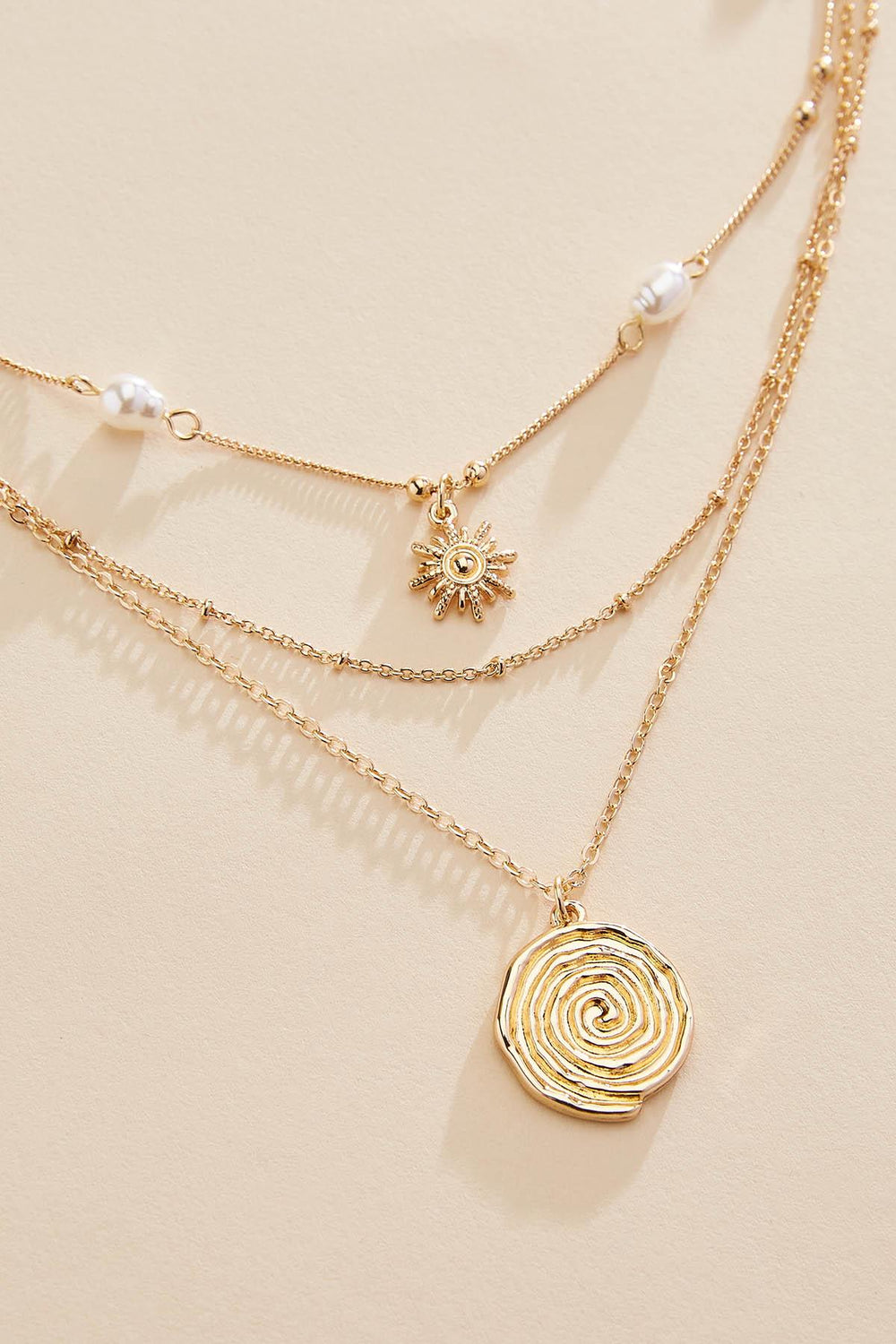 gold sun swirl pendant layered necklace Versona Trends|Jewelry
