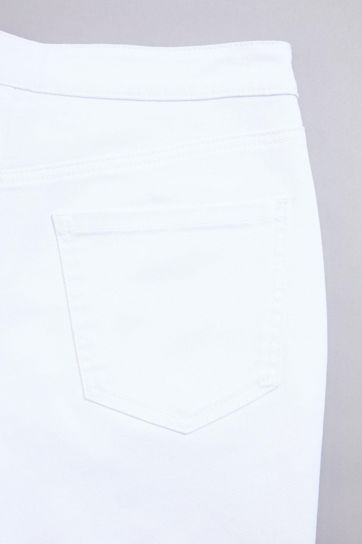 cache flared white jeans Versona Caché