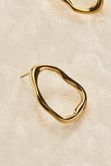 hammered gold open circle earrings Versona Jewelry