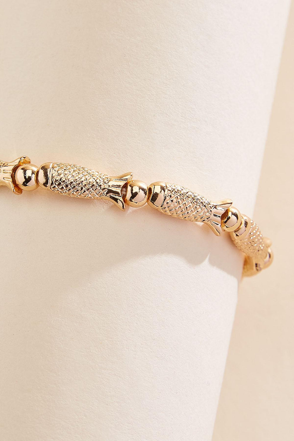 gold fish icon stretch bracelet Versona Jewelry