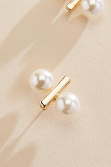 pearl seesaw stud earrings Versona Jewelry