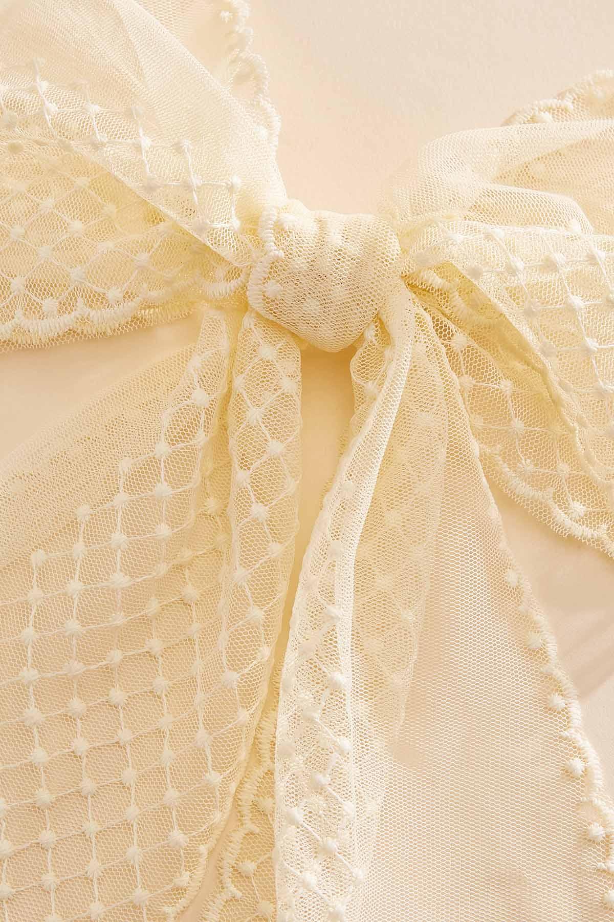 ivory scalloped tulle bow Versona Accessories