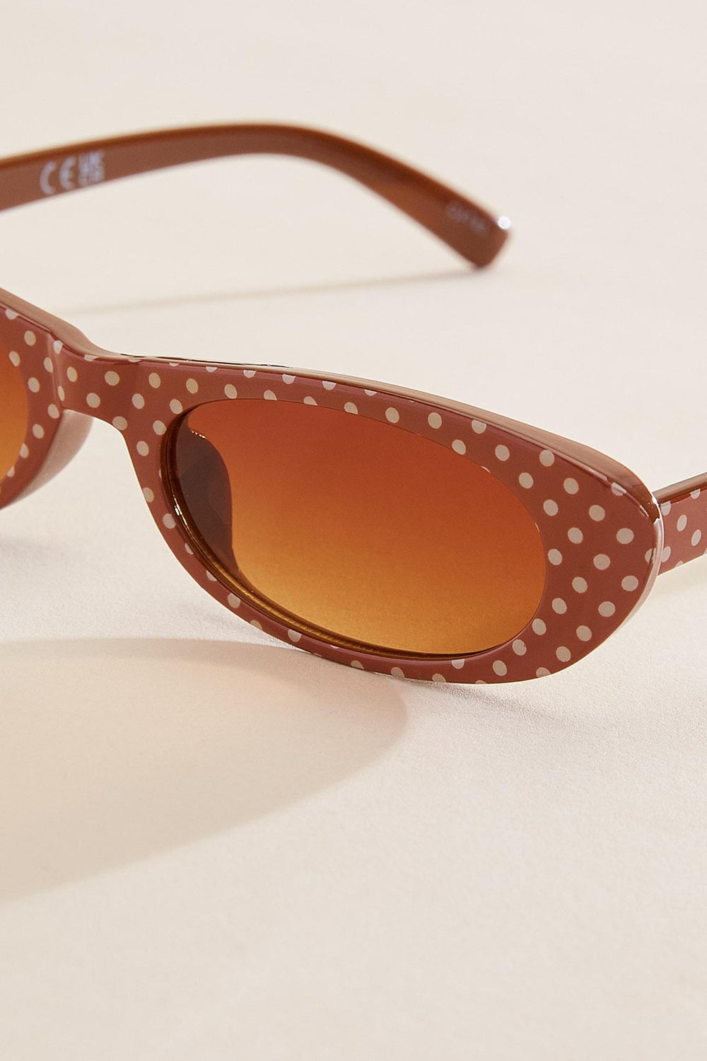 brown polka dotted oval frame sunglasses Versona Accessories