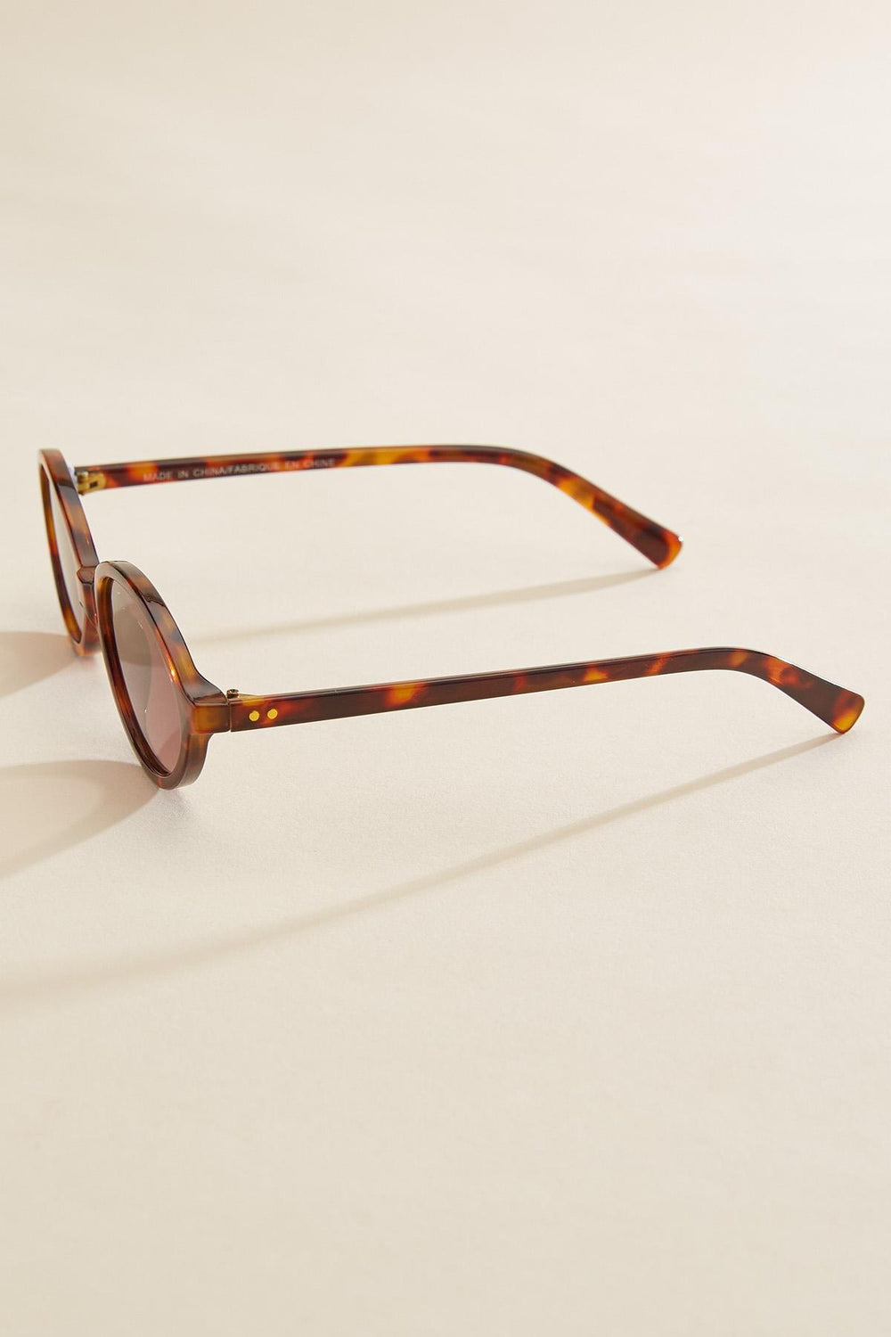 tortoise shell thin oval sunglasses Versona Accessories