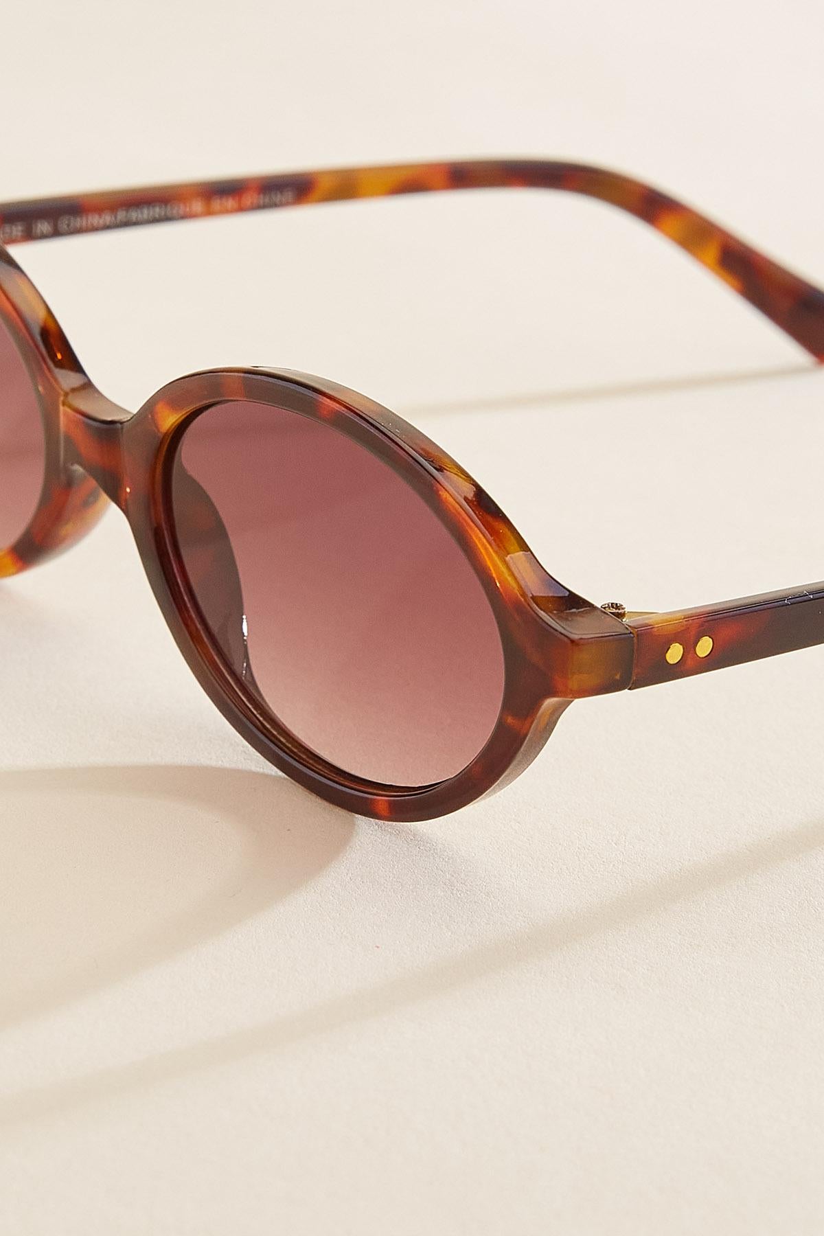 tortoise shell thin oval sunglasses Versona Accessories