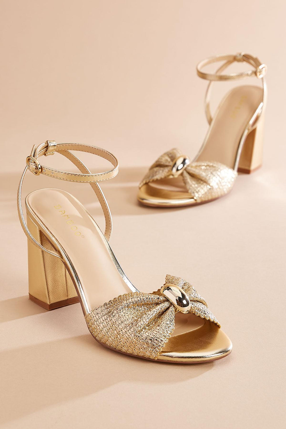 gold bow band high heels Versona Shoes