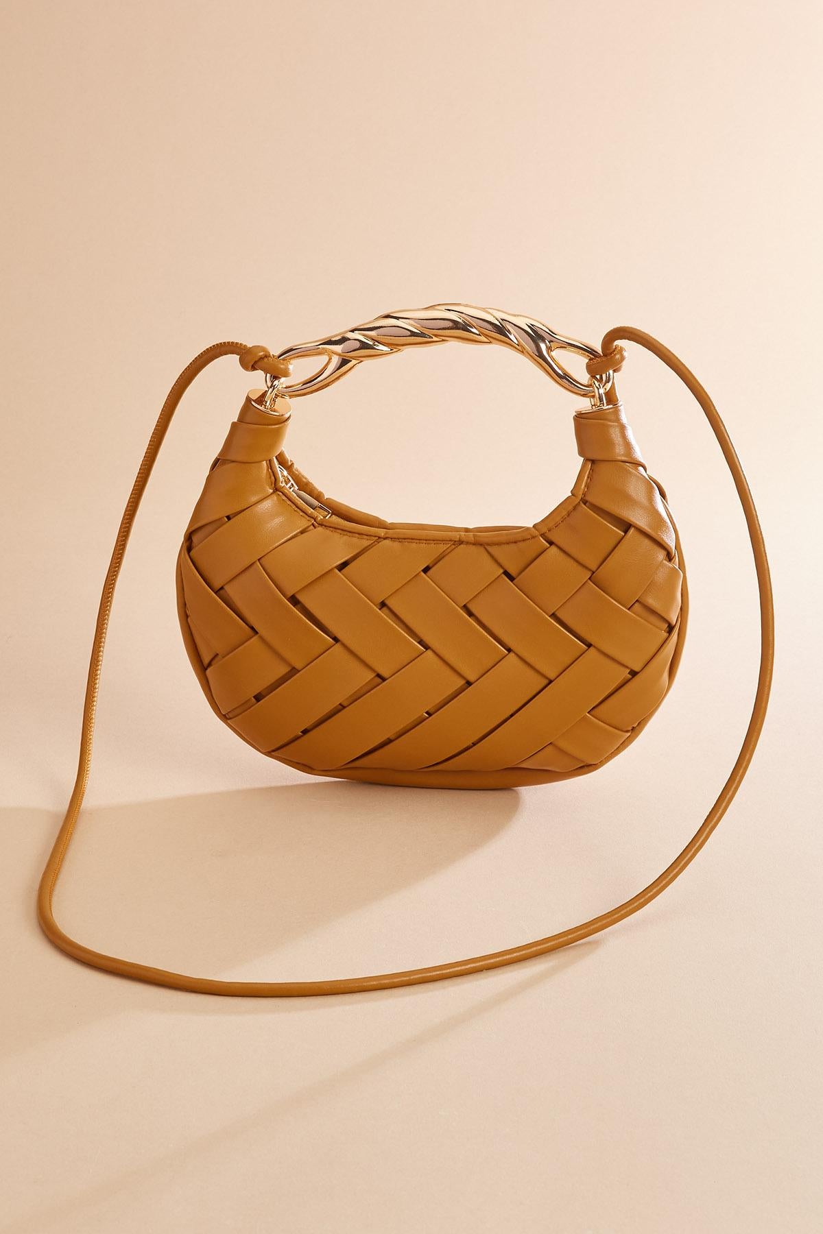 twisted gold handle woven crescent bag Versona Sale