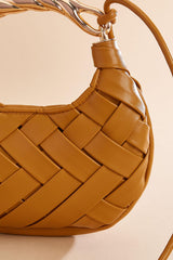 twisted gold handle woven crescent bag Versona Sale