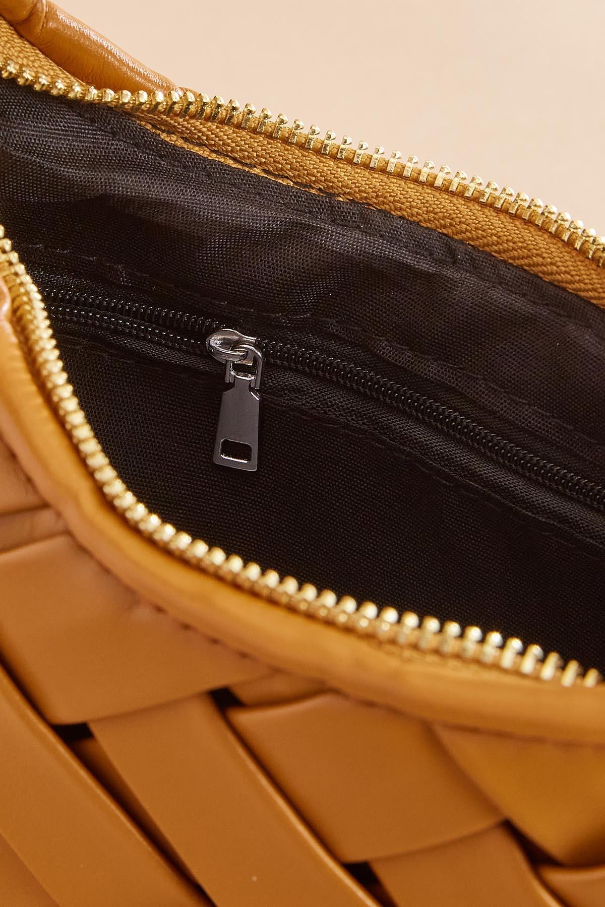 twisted gold handle woven crescent bag Versona Sale