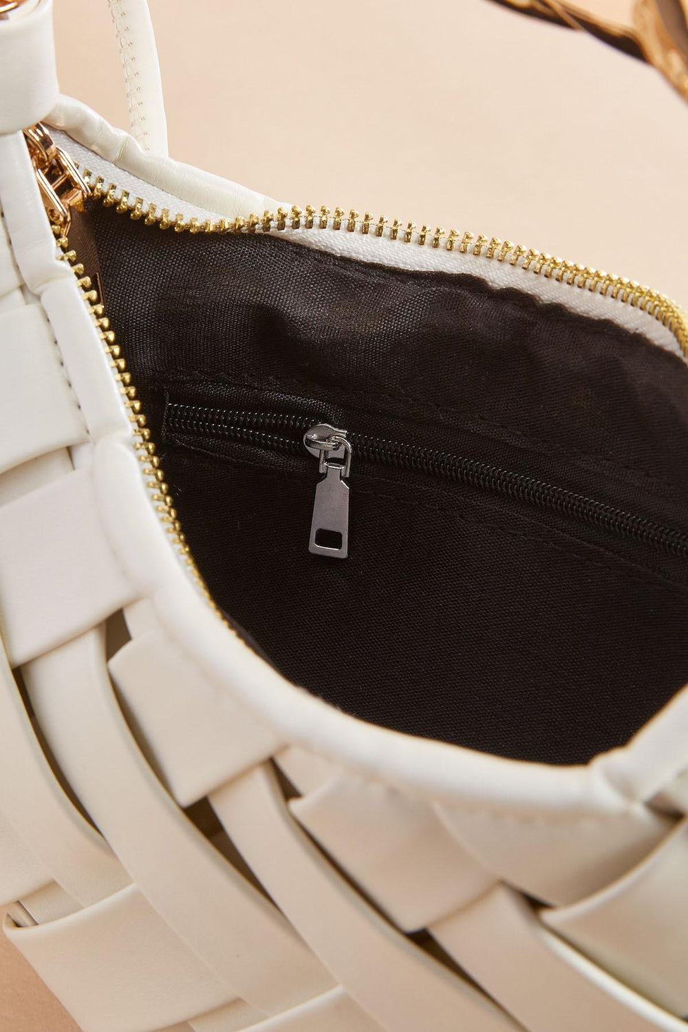 twisted gold handle woven crescent bag Versona Sale
